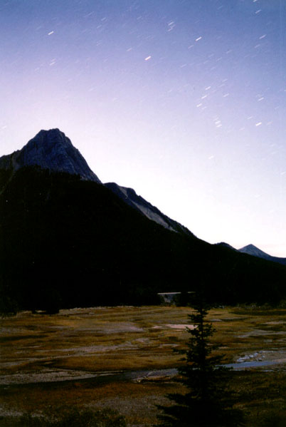 Mountains of Jasper at night... can you tell which constellation I am filming?